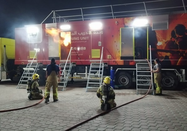 Abu Dhabi Civil Defense Executes a Drill Using the Mobile Vehicle for Training Firemen 