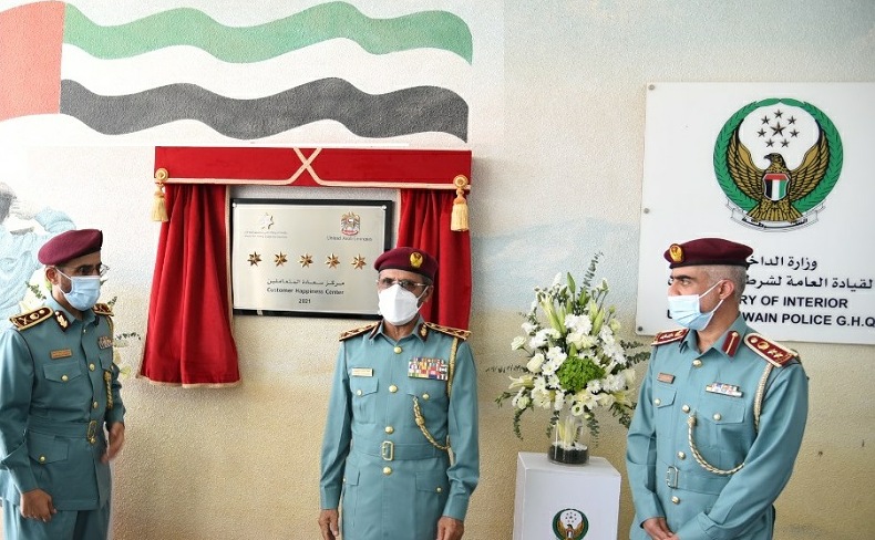 Major General Al Khalili reveals the 5 star plate at the Umm Al Quwain traffic and licensing service center and the civil defense center